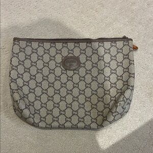 Gucci Beige and Brown Monogram Clutch👝gucci4
